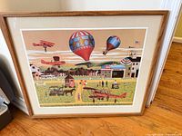 Full view of framed print with wooden frame and mat