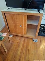 Front view showing sliding doors, finger pull, laminate top