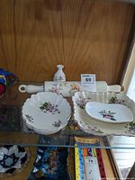 Overall view showing Wedgwood vase, ceramic rolling pin, oval and rectangular dishes
