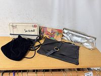 Group shot of all five clutches on shelf