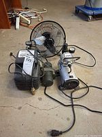 Overall view of both compressors with fan and power cords