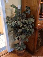 Full view of artificial tree against wall