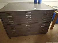 Front view of cabinet showing all ten drawers and labels