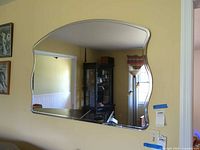 Front view of mirror mounted on wall