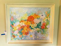 Full view of framed floral painting
