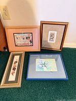 Group shot of all four framed artworks