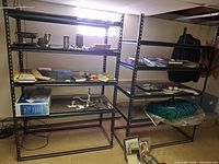 Full view of both metal shelving units side by side