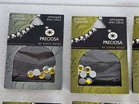 Front view of two packs showing yellow crystals