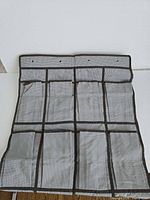 Organizer unfolded showing 24 pocket grid