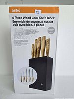 Front of sealed box showing image of knife set