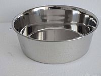 Angled view of stainless steel dog bowl showing depth and finish