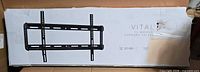 Retail box displaying Vital TV mount image and size range 37-90 in