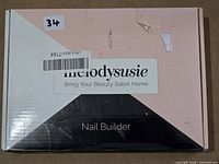 Closed MelodySusie Nail Builder box