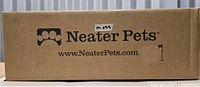 Box labeled Neater Pets containing Neater Feeder Express
