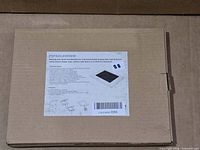 Front of sealed box with model label