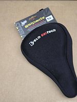 Front view of Velo GelTech Gelpadz saddle pad on retail card