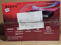 Front of sealed Sony DVP-SR510H box