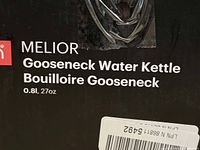 Close-up of product label showing Bodum logo, Melior series, gooseneck water kettle, 0.8 L / 27 oz
