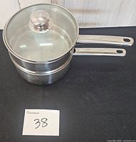 Double boiler assembled with lid on