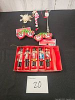 Full lot showing all ornaments: nutcrackers, glass clusters, turtle, elf, wand