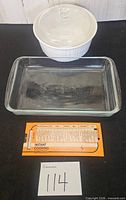 Pyrex dish, CorningWare casserole with lid, reference card