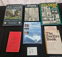 Six books laid out face up