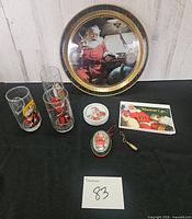 full lot overview with tray, glasses, tin, ornament, card, keychain