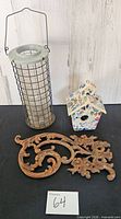 Overall lot - feeder, birdhouse, iron panel