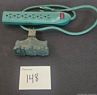 Power strip and wall tap displayed together