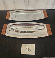 Top view of both chrome trays with wooden ends