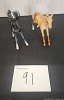 Both foal figurines front view