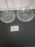 Top view showing interior patterns of both pressed glass bowls