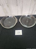 Both clear glass pie dishes side by side