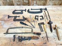 Full layout of all vintage tools on workbench