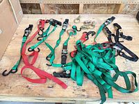 Top view of all ratchet straps, hooks and anchor rings on workbench