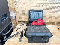 Full lot on bench showing case, rods, tools and reels