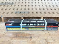 Front view of boxed Grip Universal Engine Cradle