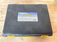 Closed carrying case with identification label