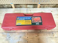 Closed red carrying case top view