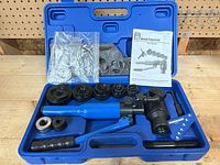 open case showing full punch kit components