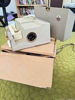 Left front view showing lens and housing