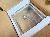 Ultrasonic cleaner tank with lid in foam inside original box