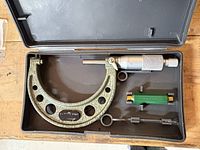 Mitutoyo micrometer with accessories in case