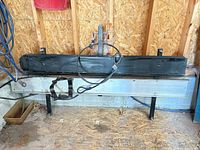 Full front view showing length of steel tray and aluminum rail