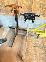 Front view of two steel engine stands side by side