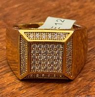 front view of ring showing cubic zirconia cluster top