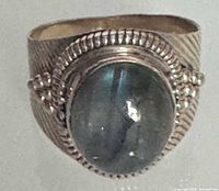 Front view showing labradorite cabochon and beaded bezel