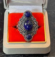 Top view of ring showing three lapis lazuli stones and filigree detailing