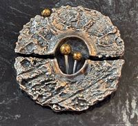 Front view showing overall design and gold accents