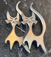 front view showing twin cat design